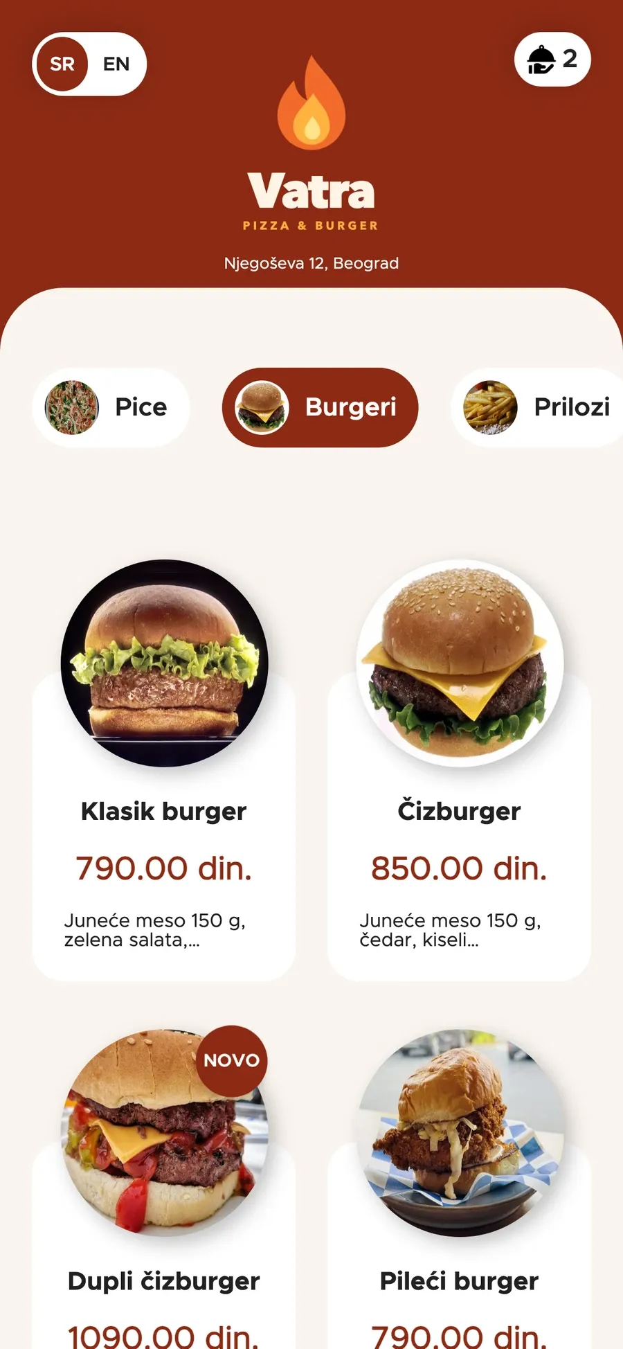 Orbi online poručivanje na telefonu: meni burgera sa fotografijama i cenama, dva artikla u korpi.